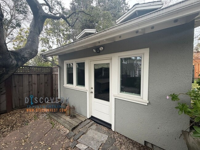 Building Photo - Lakeshore Craftsman with Detached Cottage and Versatile Bonus Rooms