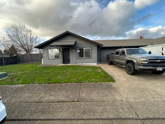 Building Photo - Beautifully Remodeled 2 Bedroom 1 Bath Duplex w/ Large Yard!! Pets are welcome! Electric car char...