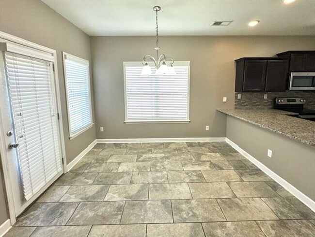 Building Photo - Luxury, Style, Gated Community, 4 Bedroom ...