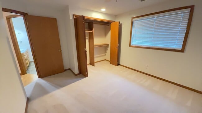 Building Photo - 4bd/3ba HUGE Home w/Hardwood Floors, Russian Fireplace, 2-Car Garage & Fenced Back Yard!