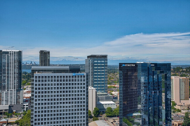 Skyline, mountain and water views meet when viewed from this Pacific Northwest penthouse terrace, unit 3102 at The Bravern - The Bravern
