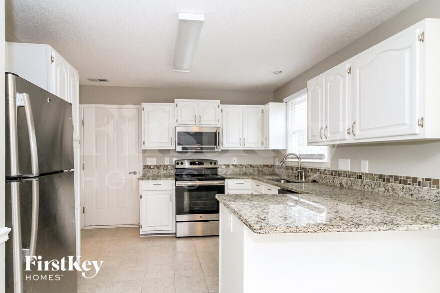 Building Photo - 3302 Sparrowhawk Dr