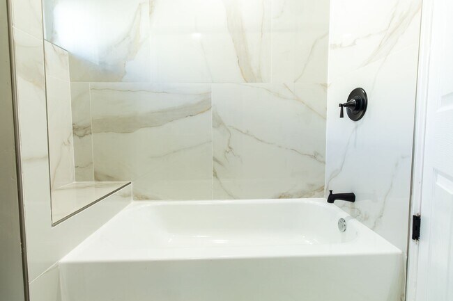 Building Photo - Spacious 3-Bedroom Single-Family Row Home ...