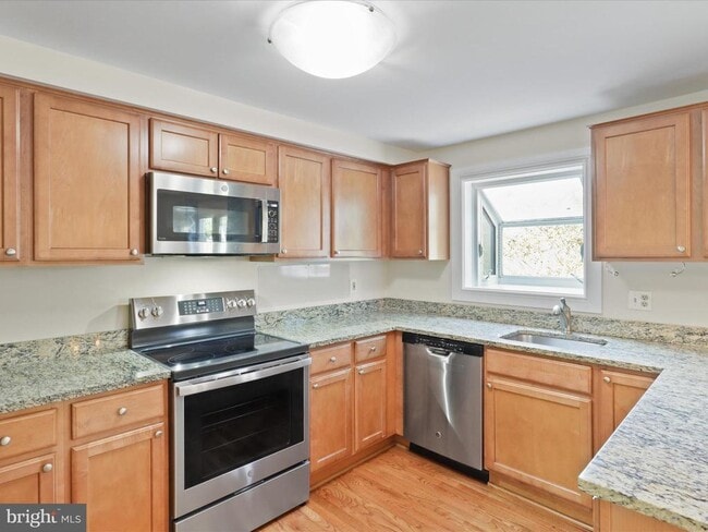 Building Photo - 6502 Coachleigh Way