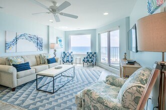Building Photo - SPEND YOUR OFF-SEASON AT THIS TOP FLOOR OCEANFRONT CONDO