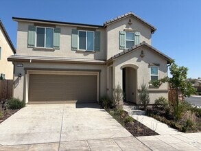 Building Photo - Welcome To This Charming Two-Story Home Ne...