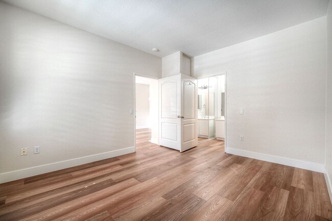 Building Photo - Coastal Living at Its Best – Upgraded 1BR Condo with Private Patio & Resort-Style Amenities