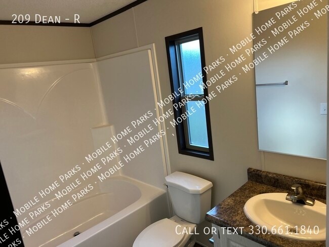 Building Photo - 209 Dean-R