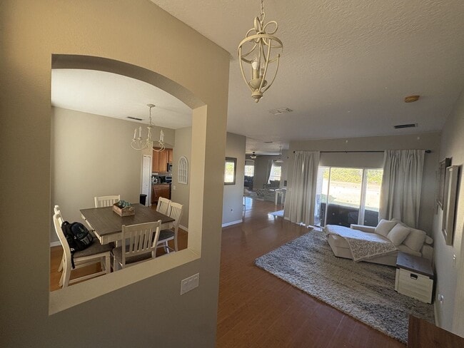 Building Photo - Florida Living Starts Here — Gated, Single-Story, Move-In Ready May 1!