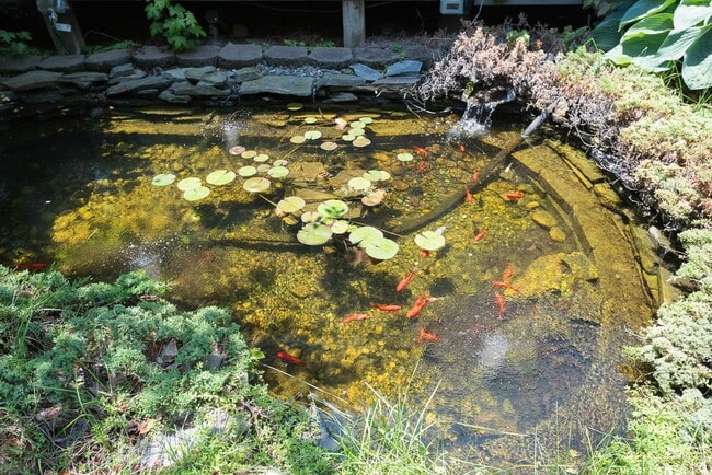 Building Photo - Spacious & Striking 3-story brick Executive 4 bedroom 4.5 bathroom home in Oak Ridge NC + Lawn ca...