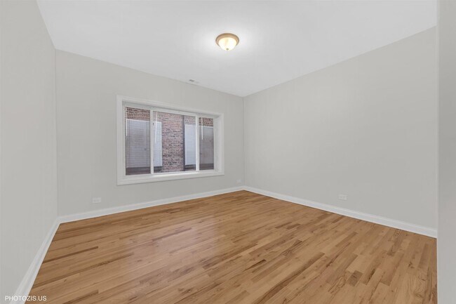 Building Photo - 6711 S Paxton Ave