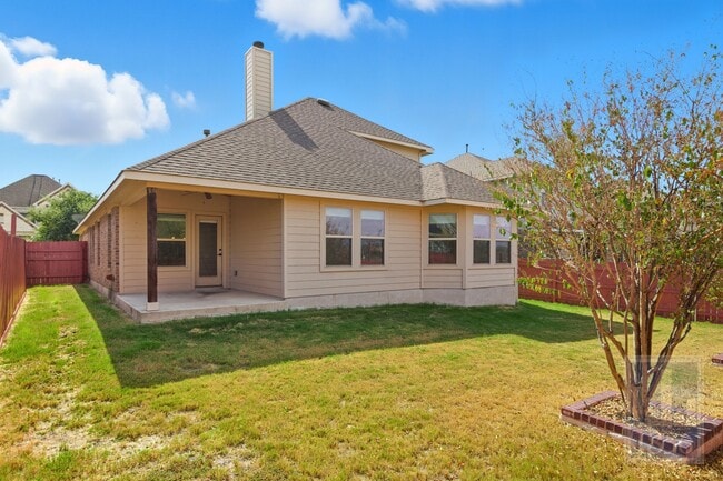 Building Photo - 8336 Paola St