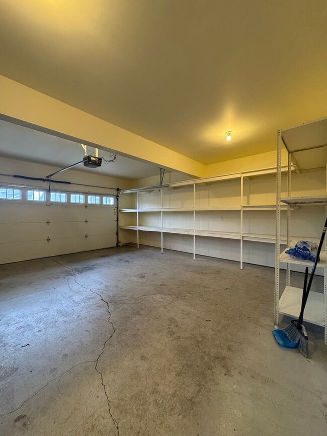 Building Photo - Spacious 5-Bedroom Home with Fenced Yard & Oversized Garage