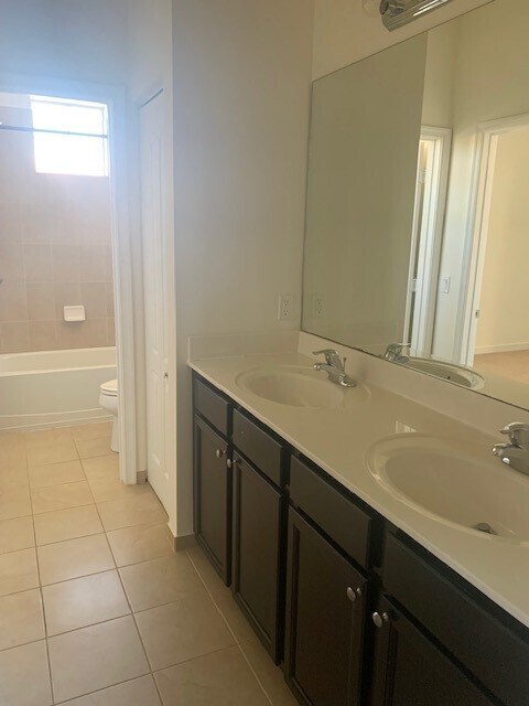 Building Photo - 9488 SW Merlin Ct