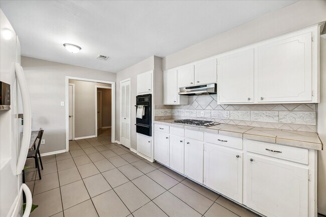 Building Photo - 5811 Spruce Forest Dr