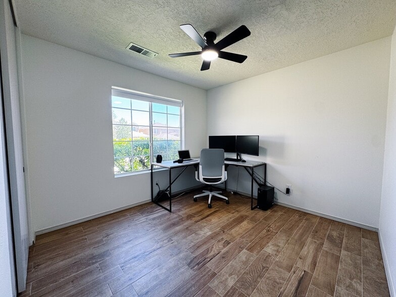 Building Photo - 7520 Button Quail Ave NW