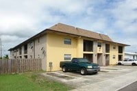 Building Photo - First Apartments