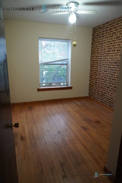 Building Photo - 1259 W Devon Ave