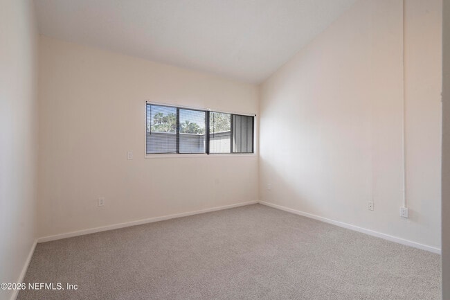 Building Photo - 9787 Sawgrass Dr E