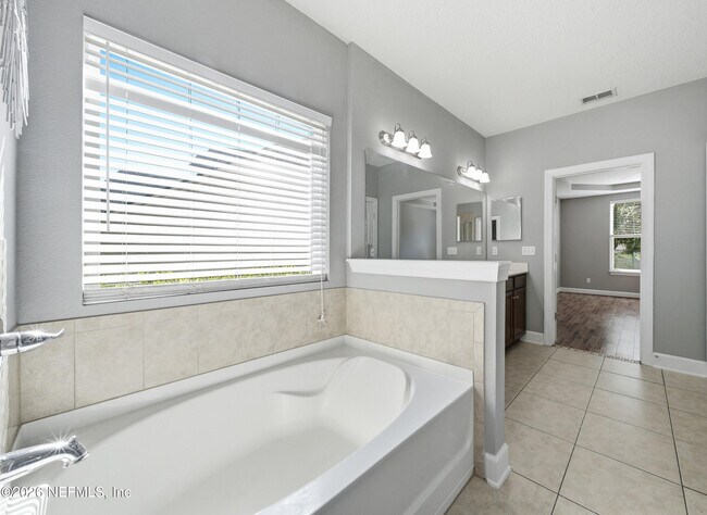 Building Photo - 4483 Plantation Oaks Blvd