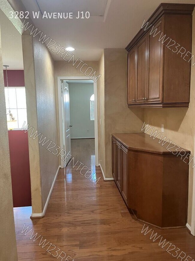 Building Photo - 3282 W Ave J 10