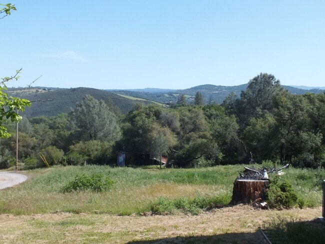 Building Photo - Rescue 4/3 retreat - includes separate cottage/office, 2 garage bays, RV pad and 5 acres with Sie...