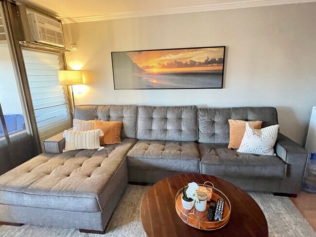 Furnished living room with chaise couch. - 1521 Alexander St