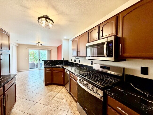 Building Photo - UPGRADED 2 BEDROOM TOWNHOME | SOLAR + PRIVATE YARD | SILVERADO RANCH / HENDERSON