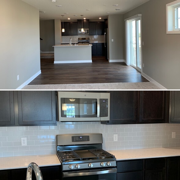 Kitchen contains GE Slate appliances (gas stove, dishwasher, side by side fridge, microwave). Dark cabinetry, ceramic backsplash, and Silestone quartz countertops make this kitchen a delight to cook in. - 4825 Martingale Drive