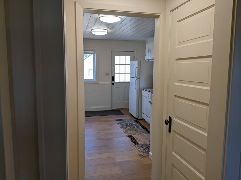 Door to basement has a cat hole - 4419 Cooke St