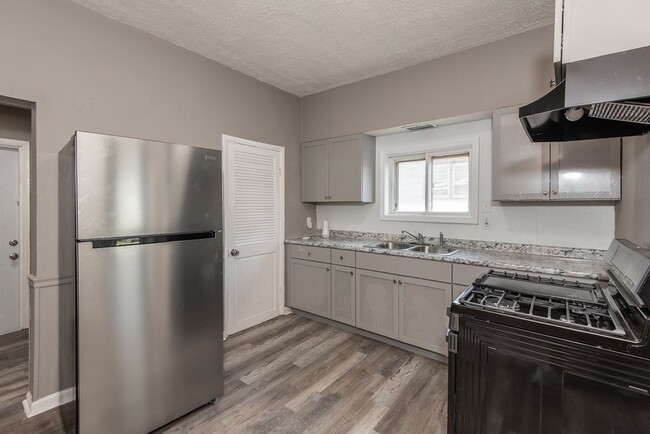 Building Photo - 8819 North Ave