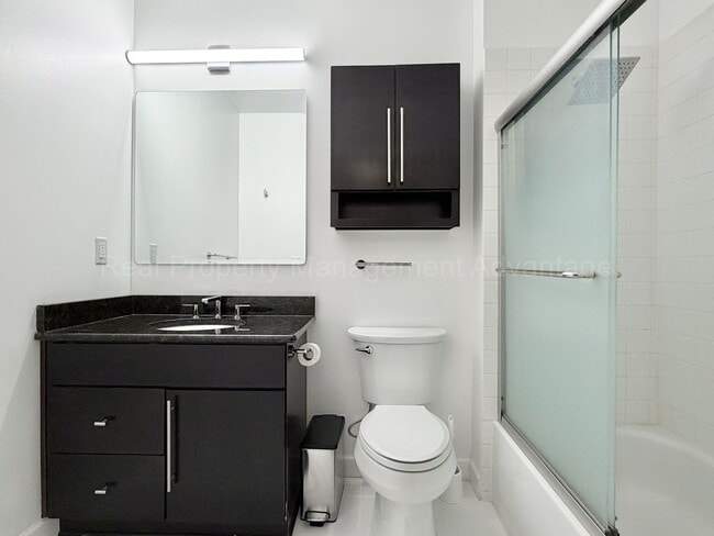 Building Photo - 2BR/2BA Skylofts Condo with Balcony & Garage Parking