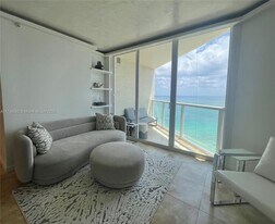 Building Photo - 16699 Collins Ave