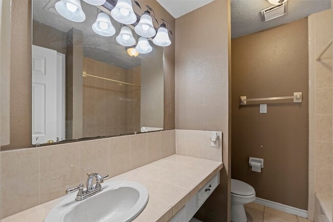 Building Photo - 14154 Whispering Palms Dr