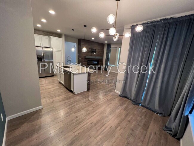 Building Photo - 9010 E Caley Way