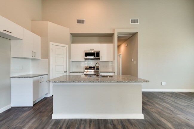 Building Photo - GORGEOUS 3 BEDROOM FOUR PLEX LOCATED IN MI...