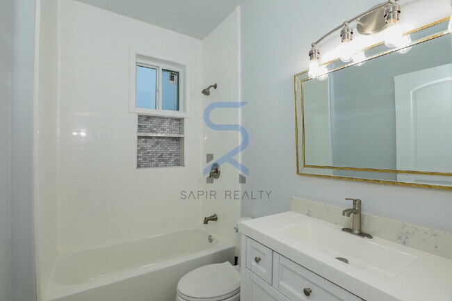 Building Photo - Move in before January 31st and choose your reward: a $250 Amazon Gift Card or a 55" Smart TV!