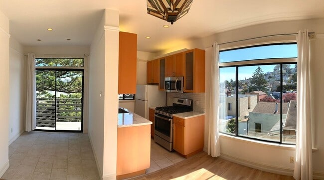 Building Photo - UPDATED BRIGHT 2BR/1BA  Top Floor Noe Vall...