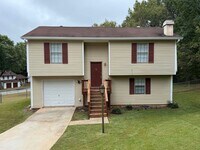 Building Photo - Stone Mountain 4 bed 2 bath Home with Fenced Backyard.