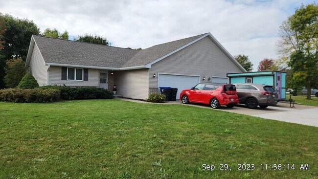 2 large attached garage. Brand New Door and openers - W3183 Westowne Ct