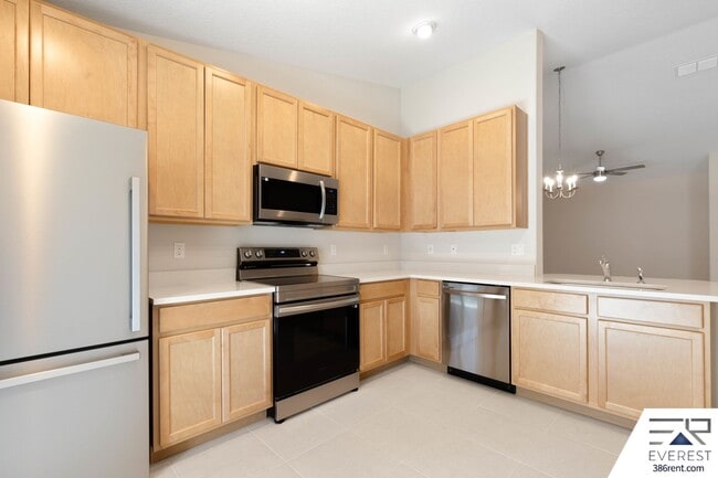 Building Photo - FULLY FENCED, LIKE- NEW 3/2/1 TOWNHOUSE ON A CUL DE SAC IN BEAUTIFUL SEMINOLE WOODS