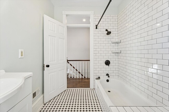 Building Photo - Stylish Phoenixville Rowhome with Exposed Brick, High Ceilings & Central Air