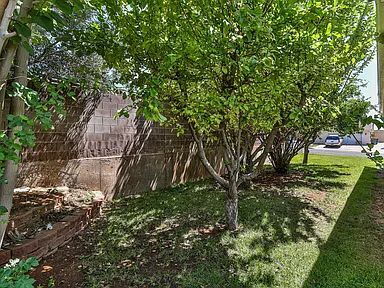 Building Photo - "Charming 4-Bed Oasis with Elegant Hardwoo...