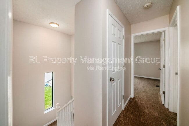 Building Photo - 7179 Feather Ct