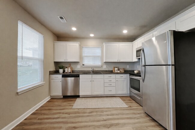 Building Photo - Spacious 3-Bedroom Home with Hardwood Floors & Patio in Blue Springs, MO