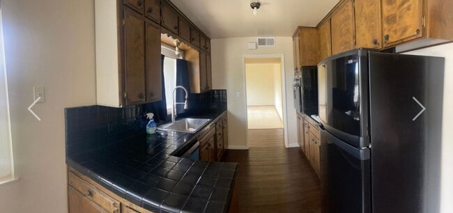 Building Photo - 3 Bedroom / 1.5 Bathroom with pool for ren...