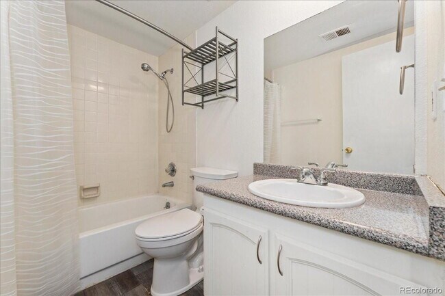 Building Photo - "Charming 2-Bed Condo with Cozy Fireplace in Prime Arvada Location!"