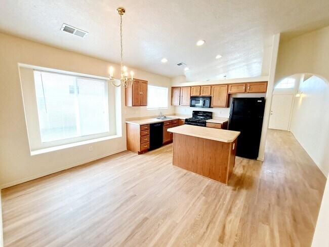 Building Photo - Gorgeous 4-bedroom, 2-bath home featuring two spacious living areas