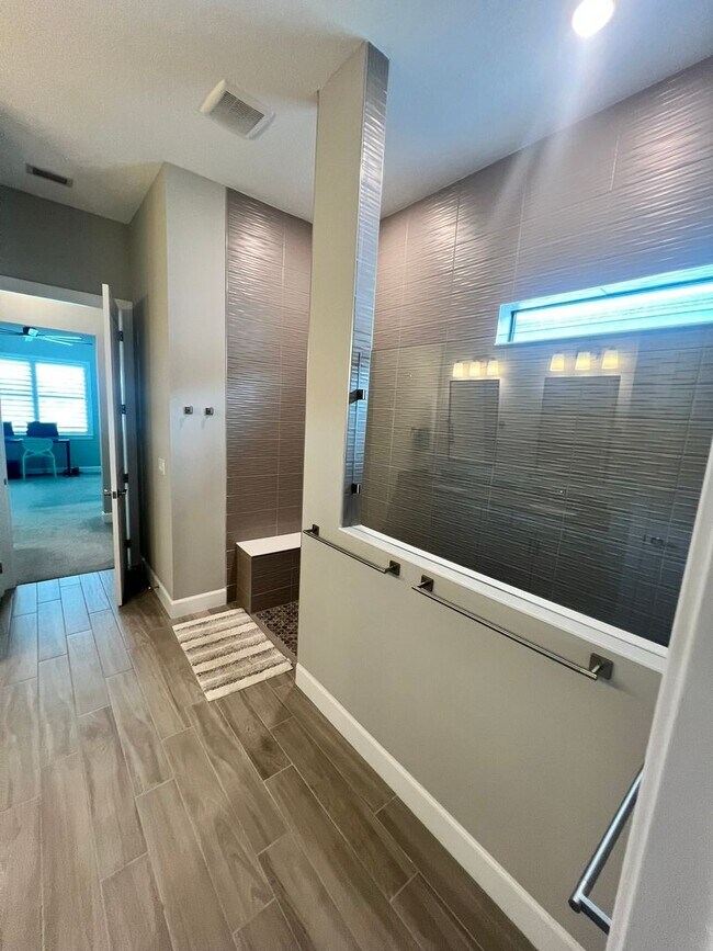 Building Photo - STUNNING LAKEFRONT 3 BEDROOM, 2.5 BATH HOM...