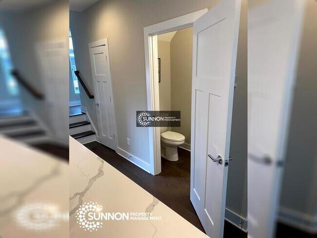 Building Photo - Modern 2 BR 2.5 BA Townhome with Rooftop D...